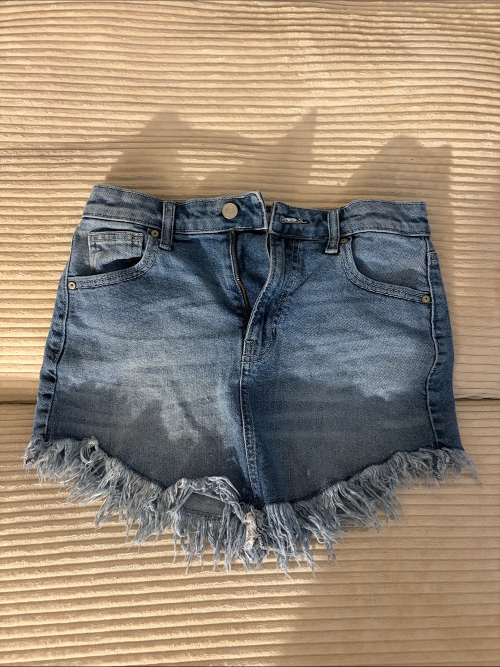 Celebrity Pink Distressed Light Blue Denim Mini Skirt